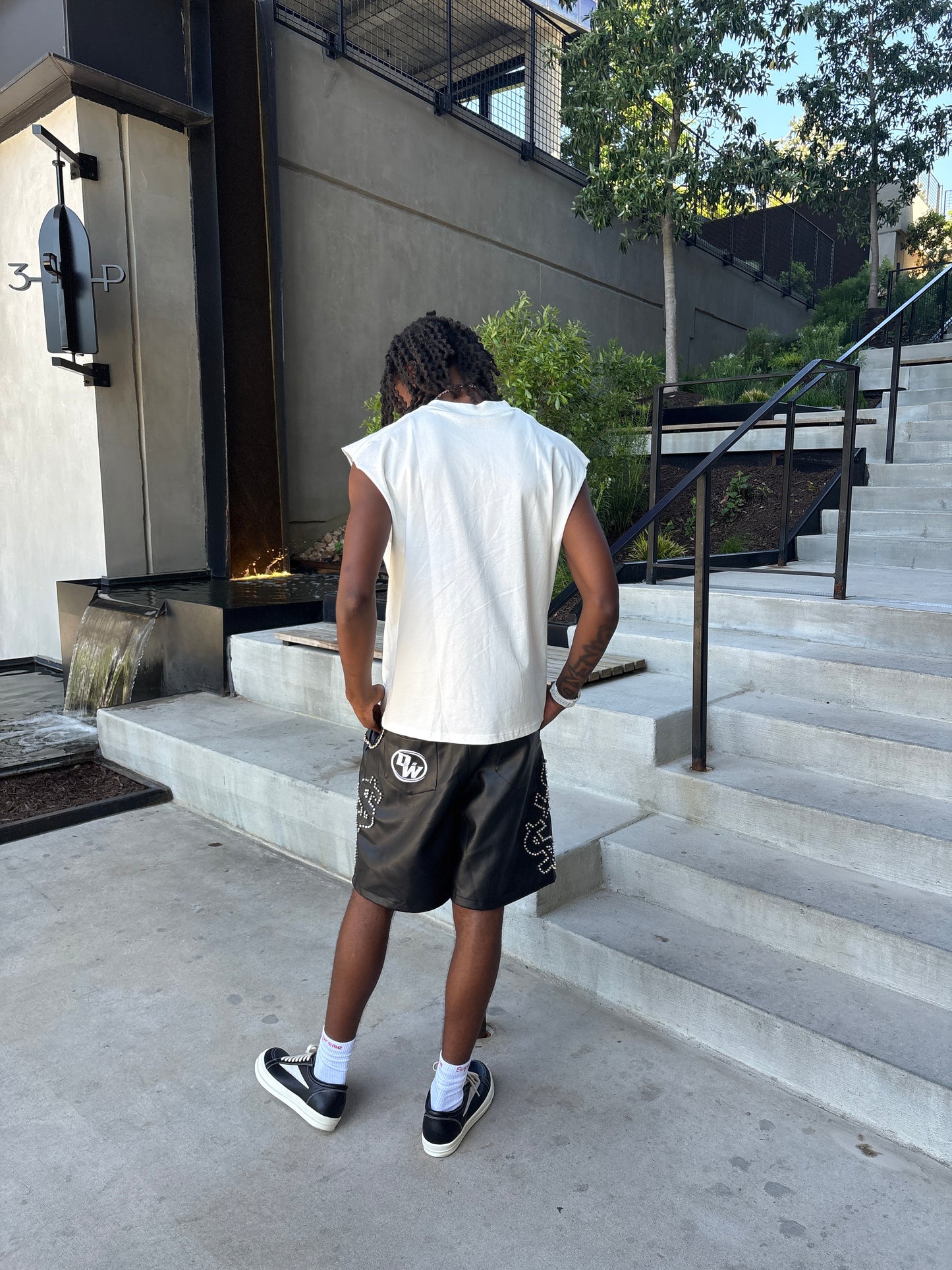 "Dinero rhinestone leather jorts"
